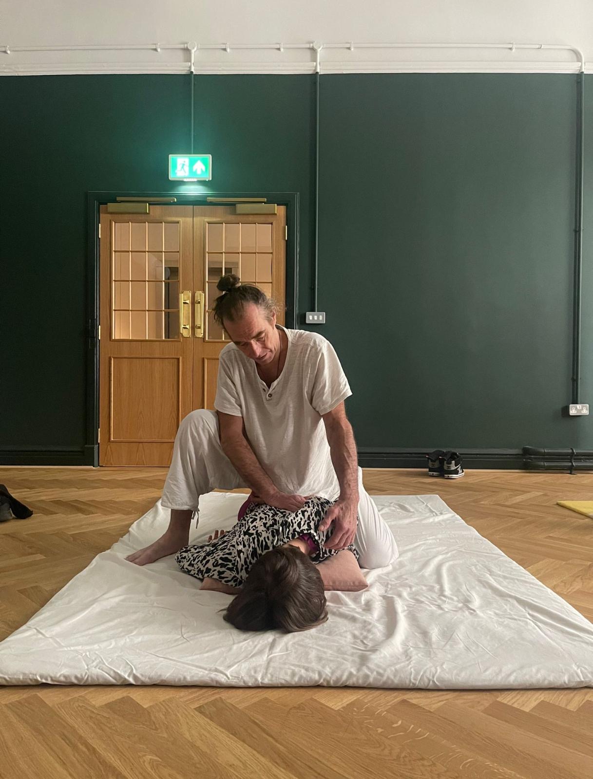 Shiatsu Massage (sheet and floor) being performed